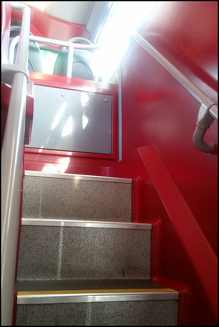 stairs on a red Oxford bus
