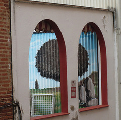 Mural on corrugated coating.