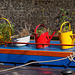 Colourful watering cans