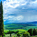 Pienza, Toscana - Behind clouds Monte Amiata, a mountain of volcanic origin in Italy