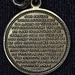 Macro of debtors prayer medallion