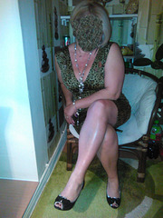 Lady M. teasing in high heels