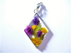 Small diamond with purple and yellow