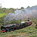 B.R. standard class 9F 9213+stanier LMS class 8F 48305 passing Darnholme with the 10.35 Gromont - Pickering service NYMR 25th September 2021.