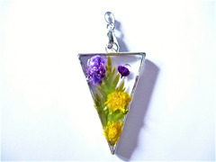 Triangle with yellow and purple flowers