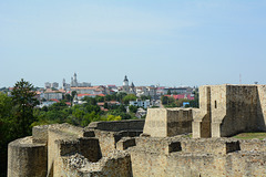 Romania, Suceava, Ruins of the Throne Fortress and the City Center in the Background