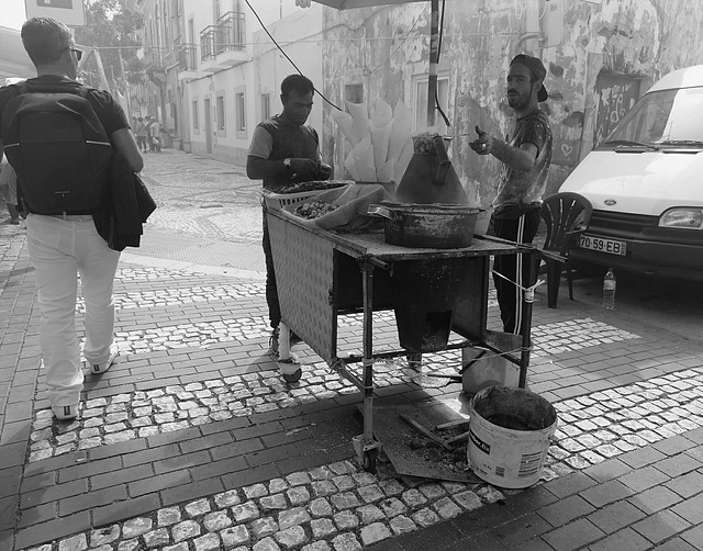 Hot smoky snacks .. at the market... 'Vila Real de Santo Antonio'.... Portugal.