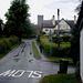 Main Street, the Black Horse and the Church of St Andrew at Foxton,