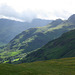 Crinkle Crags and Bowfell in cloud beyond The Langdale Pikes