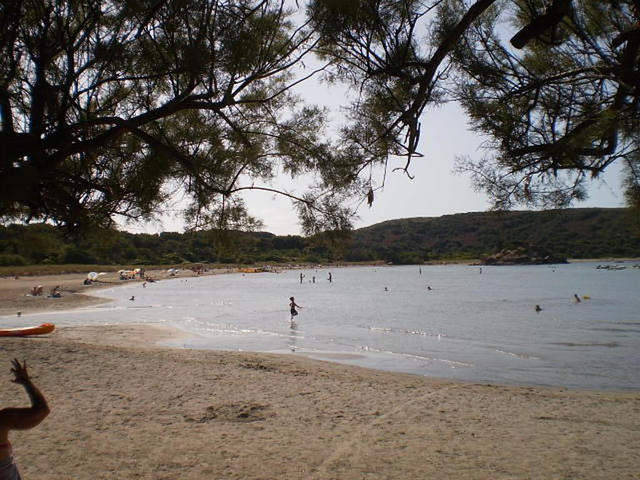 Beach with mouth of a stream.