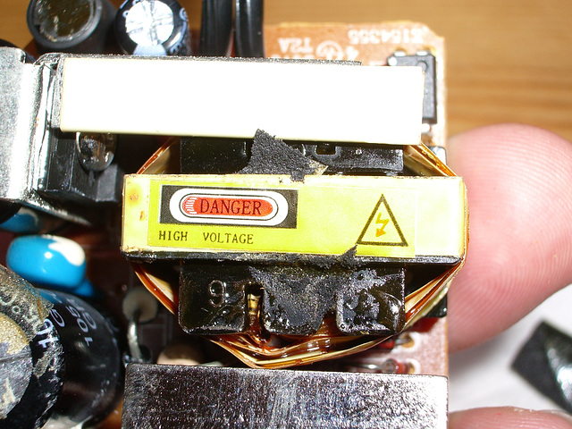 Dead power supply - high-voltage warning label