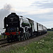 The A1 trust class A1 4-6-2 60163 TORNADO on late running (48mins) 1Z64 Scarborough - Kings Cross The Yorkshire Pullman at Willerby Carr Crossing 15th June 2019.