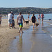 Brighton beach walkers, summer sunday