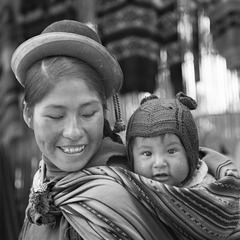 Smiling Puno mother and baby