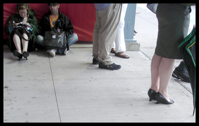 Cell phone Lady in small high heels shoes