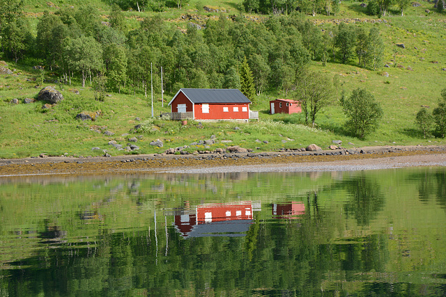 Norway, Lofoten Islands, Wooden Summer House on the Shore of Lonkanfjorden