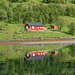 Norway, Lofoten Islands, Wooden Summer House on the Shore of Lonkanfjorden