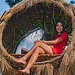 Suzan sitting in a burd nest
