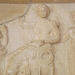 Detail of a Votive Relief from Athens with Apollo, Artemis, and Leto in the National Archaeological Museum in Athens, May 2014