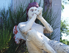 Detail of the Sculpture of a Female Nude on a Pedestal at Casa Basso, July 2011