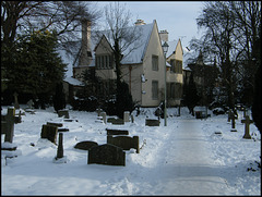 snow in Cowley Road churchyard