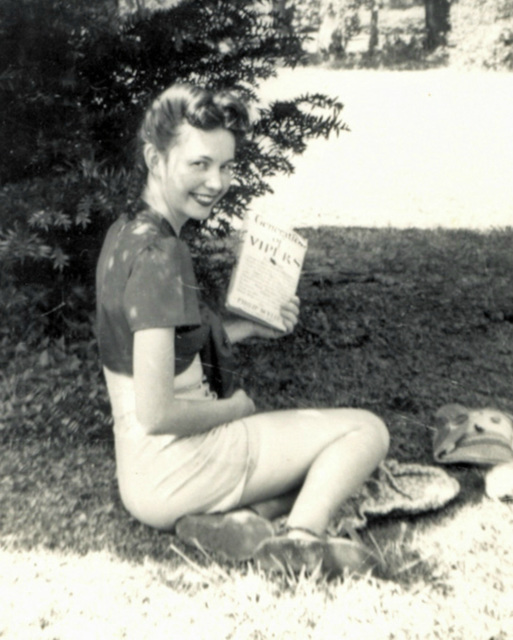 Young woman, taking a break from reading, c. 1943