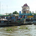Marché flottant dans le delta du Mékong...