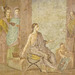 Detail of a Wall Painting with a Female Painter with a Finished Painting of Priapus from the House of the  Surgeon in Pompeii in the Naples Archaeological Museum, July 2012