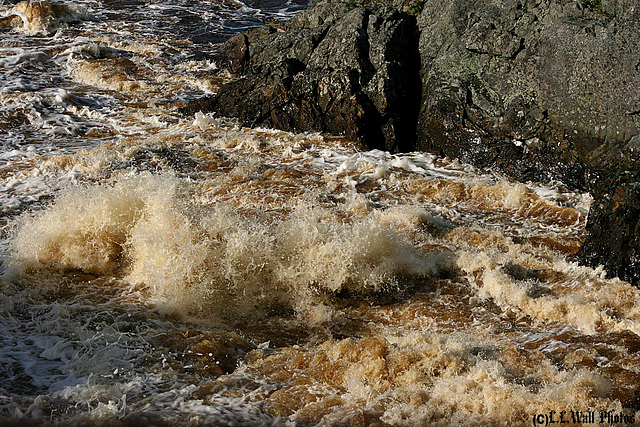 Floodwaters Pound the Rocks