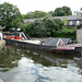 Two working barges lashed together exit Coppermill Lock
