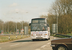 Ambassador Travel 100 (F100 BPW) on the A11 near Fiveways, Barton Mills – 3 Apr 1994 (218-26)