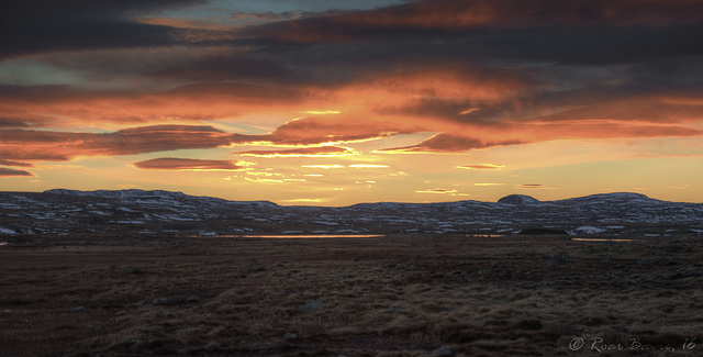 Sunset over Hardangervidda mountain plateau.