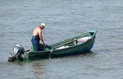Fisherman Dragging In an Empty Net
