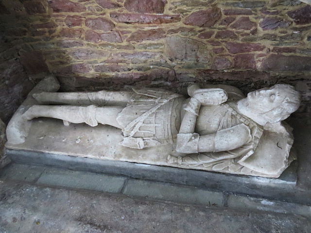 modbury church, devon,effigy of a late c15 knight of   in the south transept, with collar of roses