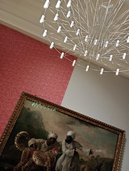 A contemporary chandelier & Cheetah & Stag by George Stubbs.