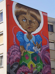 Angela Merkl's mural, by Nark.