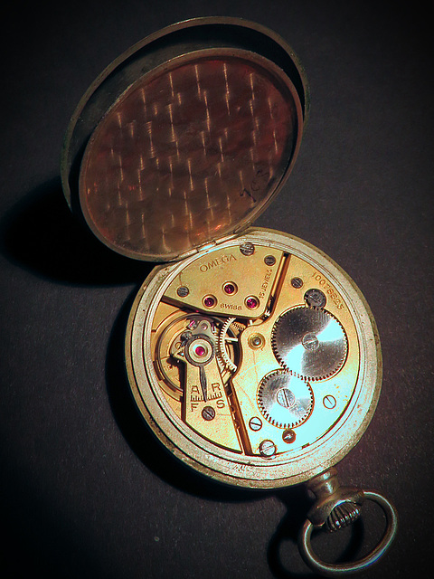 Behind the pocket watch