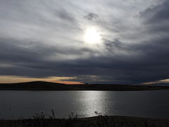 Looking into the sun at Pine Coulee Reservoir