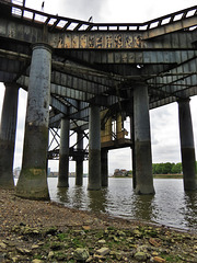 coal jetty, greenwich power station, london, massive jetty with doric columns on the thames foreshore, built by the lcc to supply the tramways power station of 1902-10.