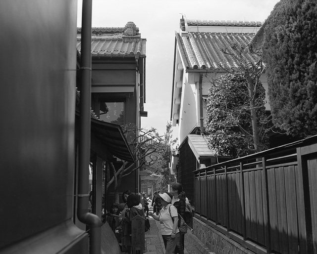 Tourists in a narrow passage