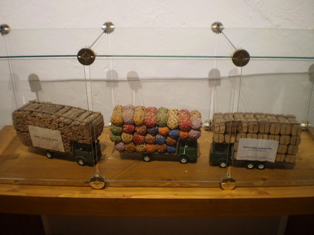 Miniatures of lorries loaded with cork.
