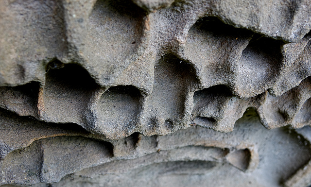Weathered and worn in life and death. Details from a Gravestone