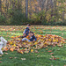 Kaylin, Adam and the dog, wallowing in the Autumn leaves