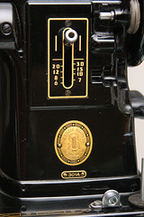 1956 Singer 301A Stitch Regulator and Badge