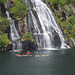 Norway, Lofoten Islands, Kayakers at the Trollfjord Waterfall