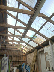 Great light from replacing one whole side of the barn roof  with translucent corrugated sheeting.