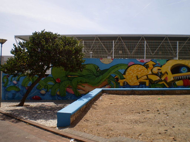 Wall of school's sports pavilion - painting by Utopia.