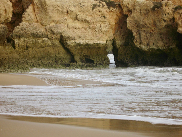 Natural arch in the limestone cliffs at Alvor (2009)
