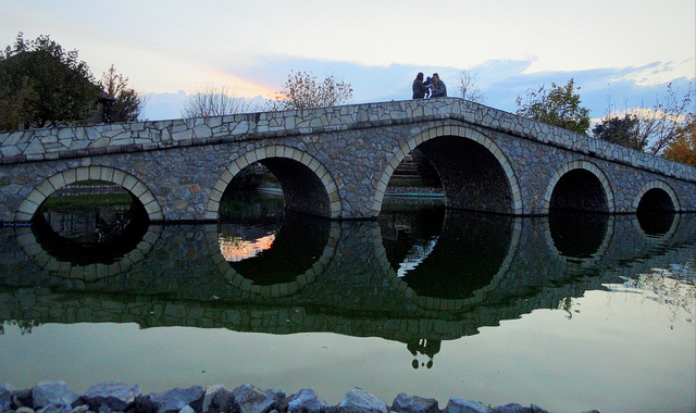 On the stone bridge at the twilight