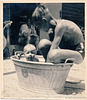 Eike und Wolf baden im Hof, ca. 1952
